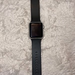 1st Generation Silver Apple Watch with charger & black band